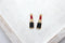 makeup charms, lipstick charms, gold plated black & red enamel clear rhinestone, mixed metal, 26mm x 7mm, hole 1.5mm, sold as 2 pieces.